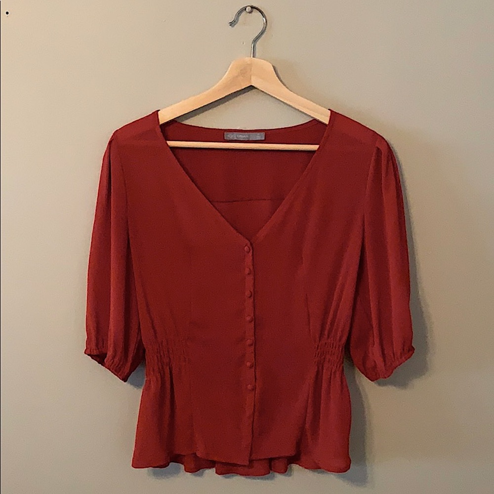 Burnt Orange Peplum blouse
